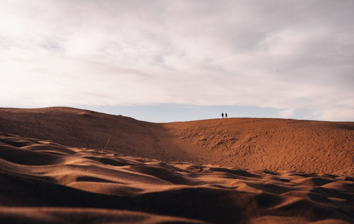 Sand dunes under a sunset sky, on the road from Marrakech to Fes