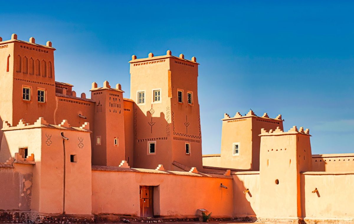 Traditional Moroccan kasbah under a blue sky